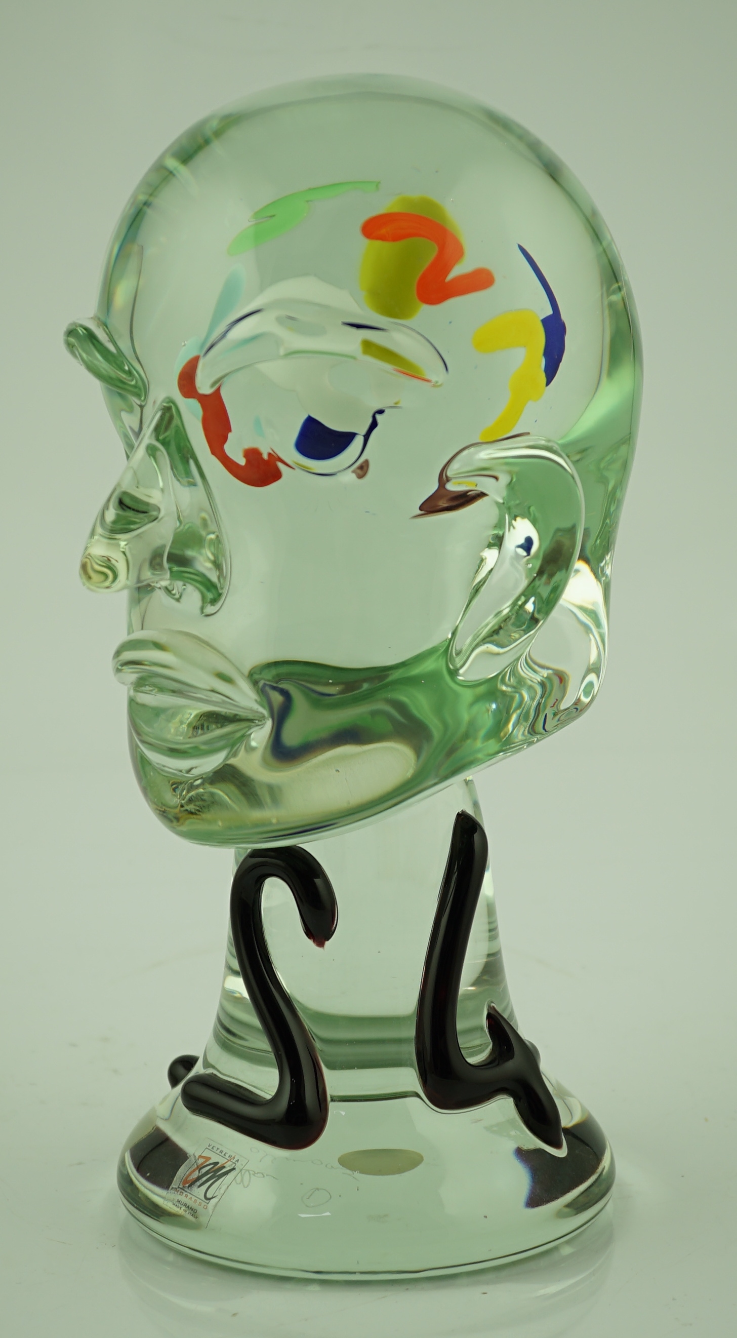 A Murano Vetreria green tinted glass head of a man